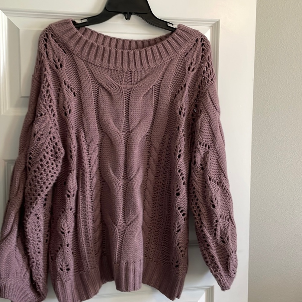 Purple sweater Size S. Fits larger